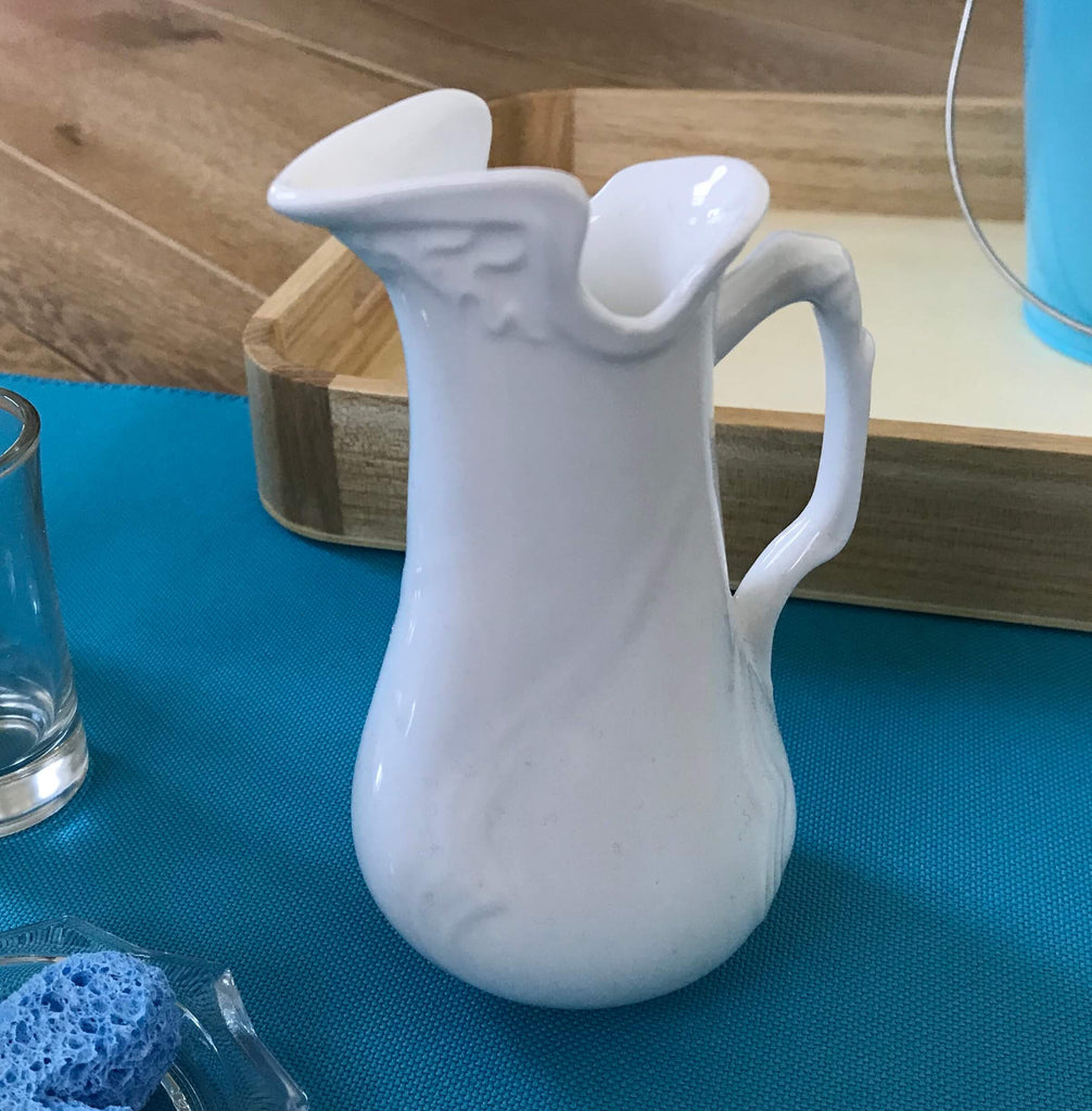 Pouring Water Pitcher to 3 Marked Glasses